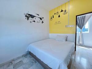 Postel nebo postele na pokoji v ubytování Ks Homestay