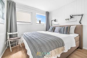 Schwimmendes Haus Hygge Olpenitz客房内的一张或多张床位