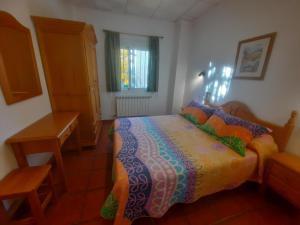Postel nebo postele na pokoji v ubytování Apartamentos Martin