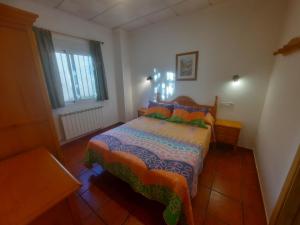 Postel nebo postele na pokoji v ubytování Apartamentos Martin