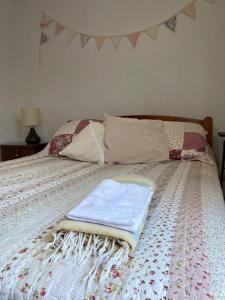 Cama o camas de una habitación en Hostal Cordillera Alta