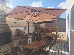 Αίθριο ή υπαίθριος χώρος στο Apartamento 1/4 Bombinhas fino acabamento +9 φωτογραφίες