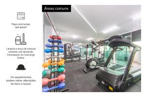 a gym with a rack of exercise equipment at Paraíso Suítes by Charlie in Sao Paulo