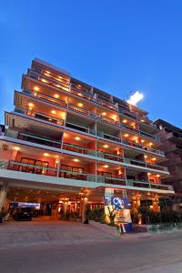 a large building with many windows and lights at Pattaya Loft in Pattaya Central