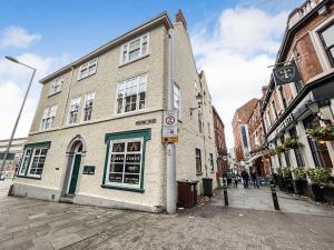 a building on the side of a street at Luxurious 2 Bedroom Apartment in City Centre in Nottingham