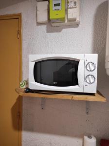 Kuchyňa alebo kuchynka v ubytovaní Appartement calme dans quartier résidentiel.