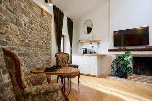 Kuchyň nebo kuchyňský kout v ubytování MM Apartments