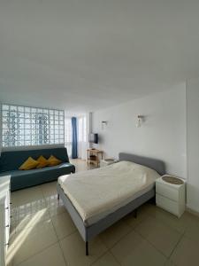 Ένα ή περισσότερα κρεβάτια σε δωμάτιο στο Studio ElDorado