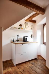 Kuchyň nebo kuchyňský kout v ubytování MM Apartments