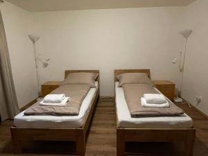 Postel nebo postele na pokoji v ubytování Haus St. Martin