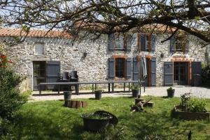 Vonkajšia záhrada v ubytovaní La Faerie - A la campagne - Gite 18 personnes