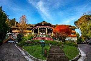 Um jardim em Hotel Casa da Montanha
