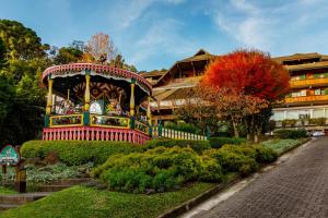 Um jardim em Hotel Casa da Montanha