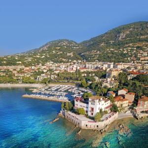 an aerial view of a town on the water at Studio entre Nice et Monaco in Beaulieu-sur-Mer