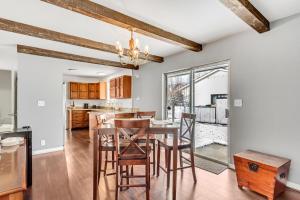 a kitchen and dining room with a table and chairs at Large Room Near UVU & BYU in Orem