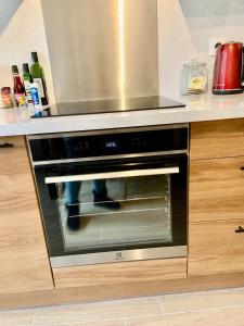 Kuchyňa alebo kuchynka v ubytovaní GRAND Appartement 85m2 centre ville de BIARRITZ 6 pers