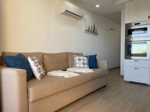 Posezení v ubytování SAN AGUSTIN SEAVIEW BLUE APARTMENT