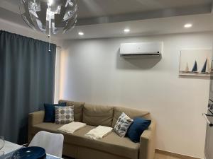 Posezení v ubytování SAN AGUSTIN SEAVIEW BLUE APARTMENT