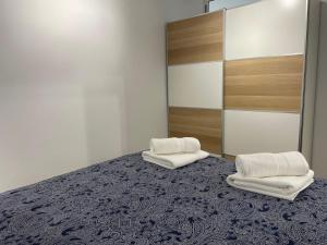 Postel nebo postele na pokoji v ubytování SAN AGUSTIN SEAVIEW BLUE APARTMENT + 37 fotografií