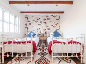 Voodi või voodid majutusasutuse The Old Smokehouse toas