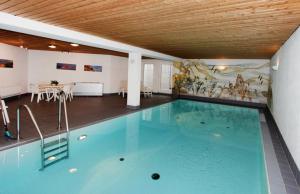 Bazén v ubytování KEITUM unique POOL I VIEW I GARDEN nebo v jeho okolí