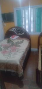 En eller flere senge i et værelse på A Casa do Chef Ubatuba