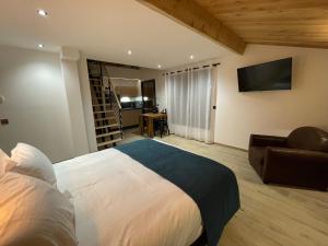 Postel nebo postele na pokoji v ubytování Appart Hôtel Le JAS