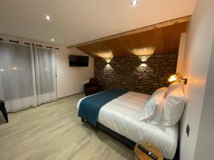 Postel nebo postele na pokoji v ubytování Appart Hôtel Le JAS