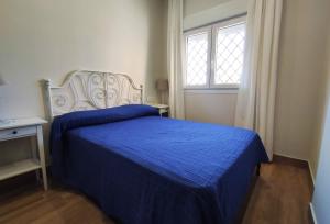 Postel nebo postele na pokoji v ubytování APARTAMENTOS SANLUCAR CASA C