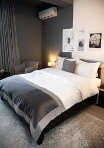 Postel nebo postele na pokoji v ubytování Triss Hotel