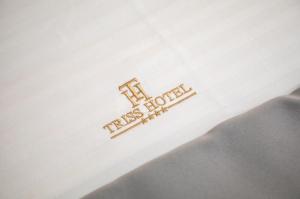 Certifikát, hodnocení, plakát nebo jiný dokument vystavený v ubytování Triss Hotel