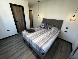 Cama ou camas em um quarto em VOY Hostales - Oriente
