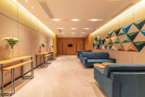 Posezení v ubytování Holiday Inn Express Yichang Riverside by IHG + 37 fotografií