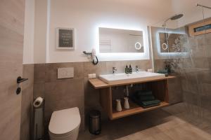 Kúpeľňa v ubytovaní Die Wiesen Apartments