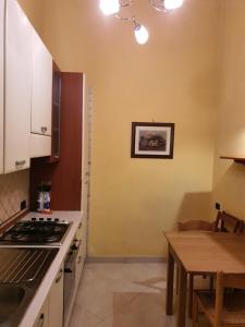 Kuchyň nebo kuchyňský kout v ubytování B&B La Stazione