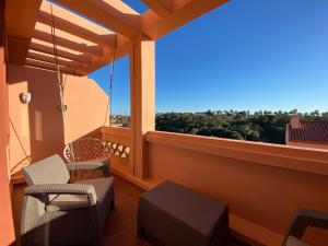 A balcony or terrace at Spacious and stylish penthouse in Mijas