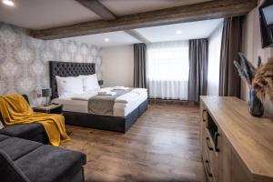 Posteľ alebo postele v izbe v ubytovaní Hotel Demanova Apartments - Dependance