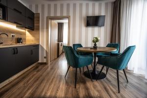 Kuchyňa alebo kuchynka v ubytovaní Hotel Demanova Apartments - Dependance