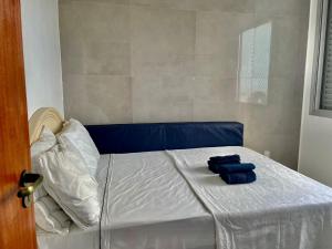 Cama o camas de una habitación en Condominio Beira Mar Apartamento 24