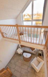 an overhead view of a staircase in a house at Das Seehaus in Nordhorn