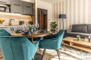 Kuchyňa alebo kuchynka v ubytovaní Hotel Demanova Apartments - Dependance