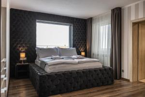 Posteľ alebo postele v izbe v ubytovaní Hotel Demanova Apartments - Dependance