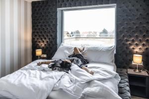 Posteľ alebo postele v izbe v ubytovaní Hotel Demanova Apartments - Dependance