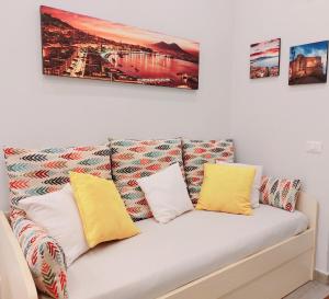 En eller flere senge i et værelse på La Preziosa Apartment