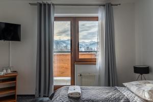 Posteľ alebo postele v izbe v ubytovaní Villa 84 & Apartments - Jacuzzi, Sauna