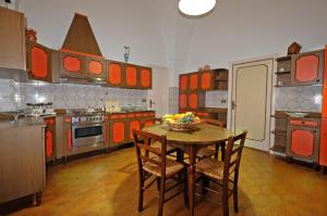 A kitchen or kitchenette at Villa Luritu Luxury Pool Tricase by HDSalento