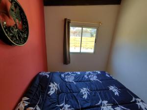 Ein Bett oder Betten in einem Zimmer der Unterkunft Villas Laura