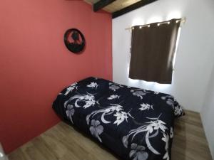 Ein Bett oder Betten in einem Zimmer der Unterkunft Villas Laura