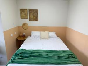 Cama o camas de una habitación en Charmoso Apartamento em Maragogi