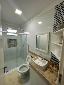 Un baño de Charmoso Apartamento em Maragogi